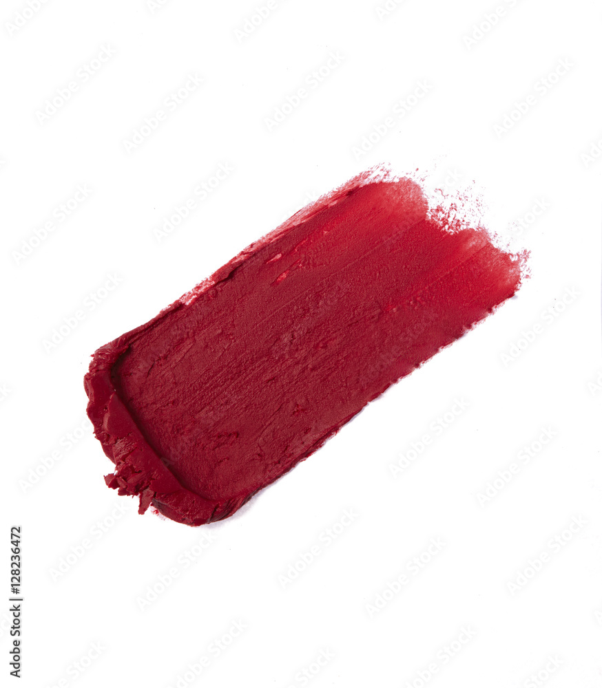 Fototapeta premium Red color lipstick stroke on background