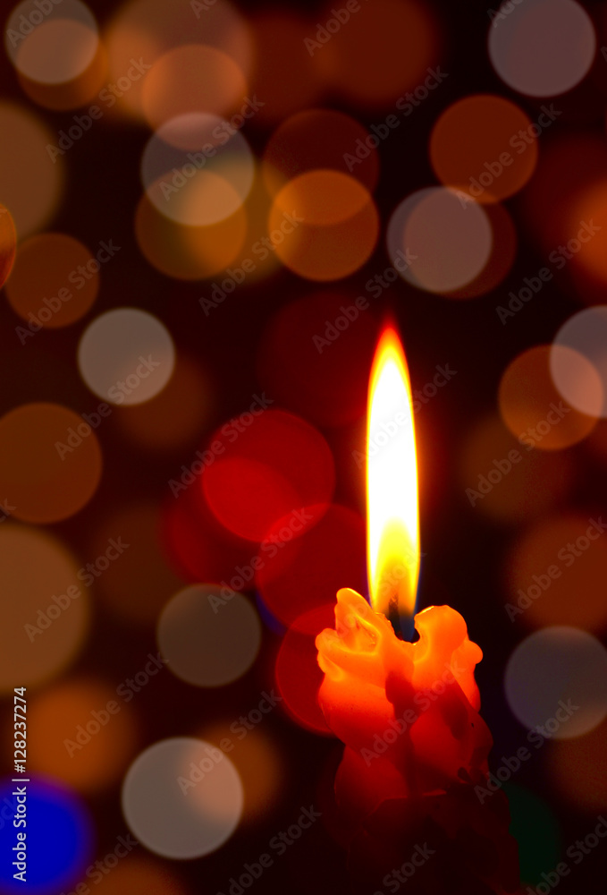 Burning candle with soft focus lights or Bokeh Burning candle with soft focus lights or Bokeh