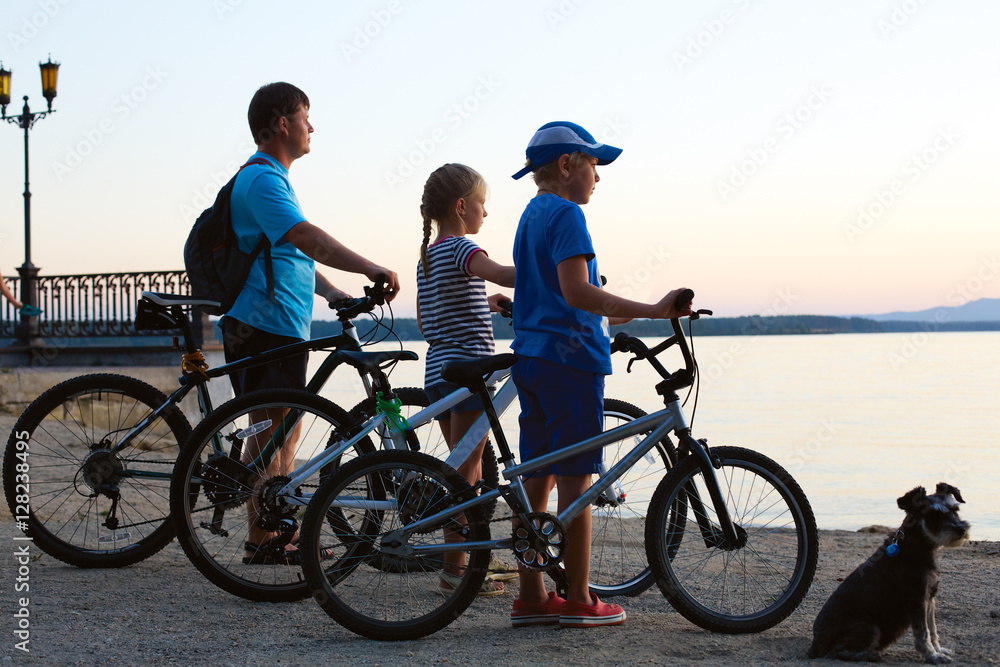 Biker family silhouette. Happy family - father with two kids on Biker family silhouette. Happy family - father with two kids on