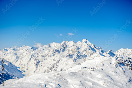 Alpine winter mountain landscape. French Alps with snow.