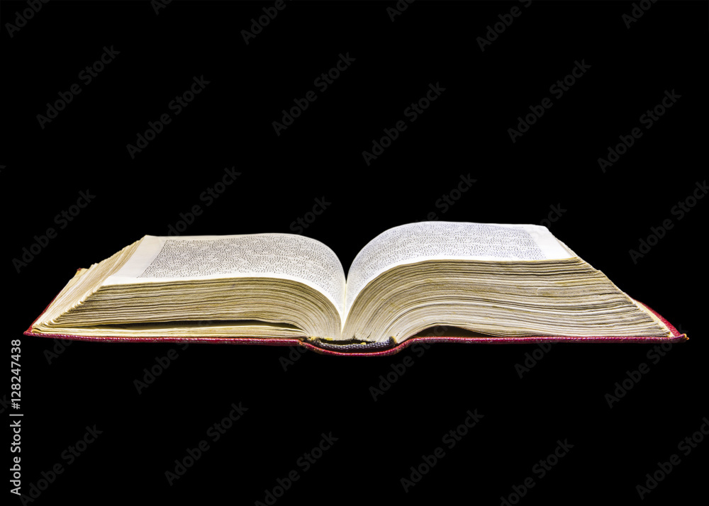 Obraz premium Old book on black background