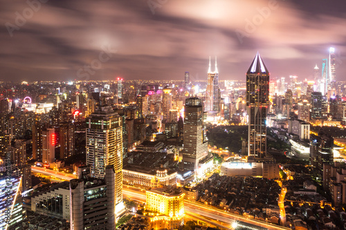 modern office buildings in shanghai at night