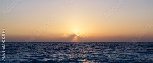 Sunset over the sea. Ocean sunset