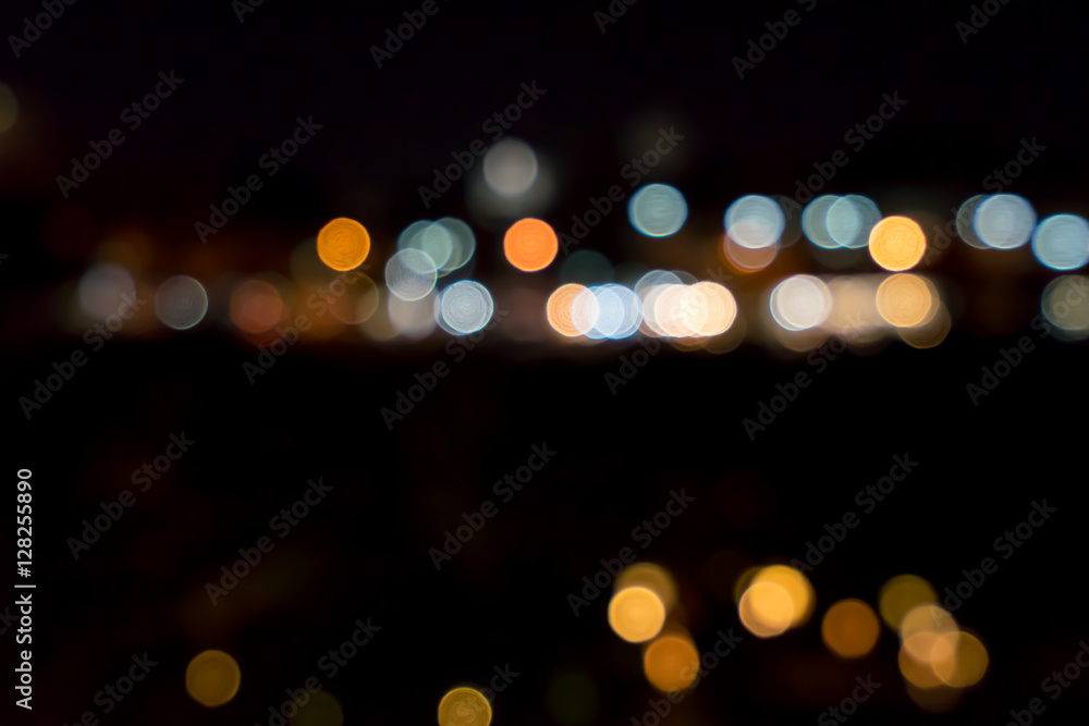 image of blurred bokeh background with colorful lights and Dark background image of blurred bokeh background with colorful lights and Dark background