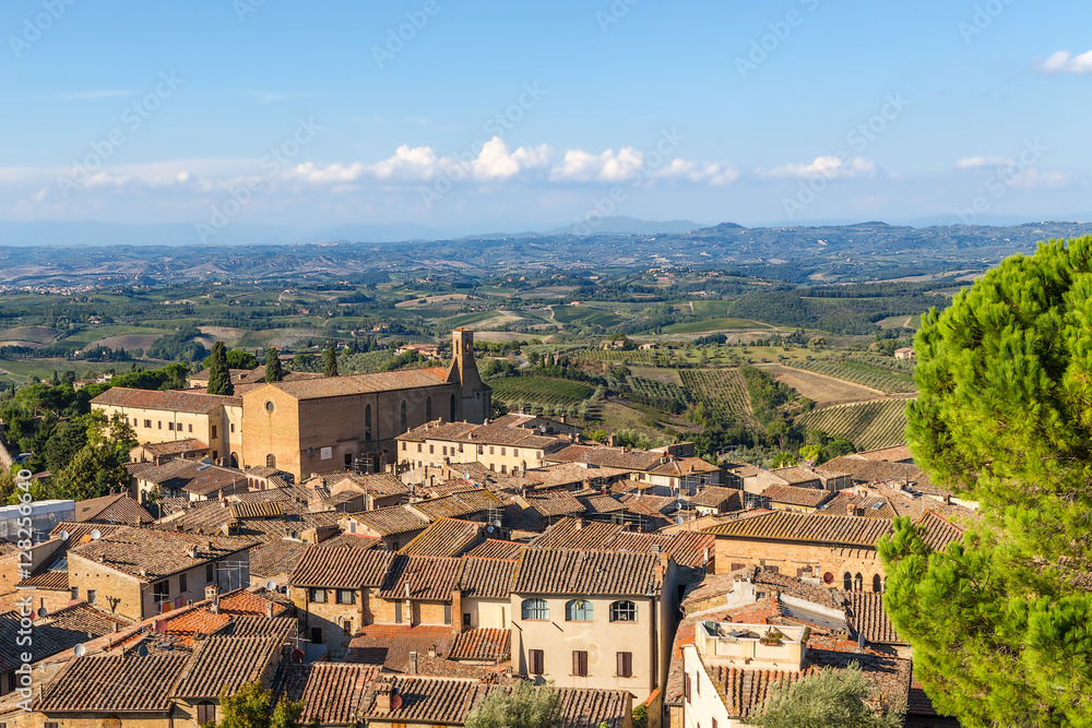 San Gimignano, Italy. Scenic view of the medieval town (UNESCO) and the Church of St. Augustine (Chiesa di Sant'Agostino), 1298