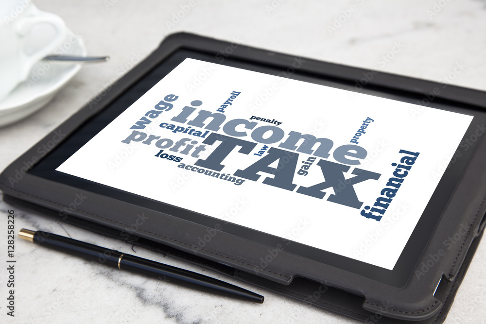 tablet with tax word cloud tablet with tax word cloud