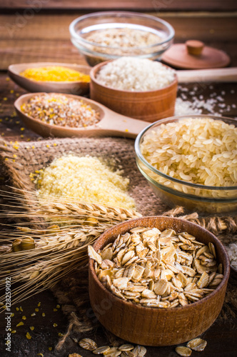 Cereals on wooden background.
