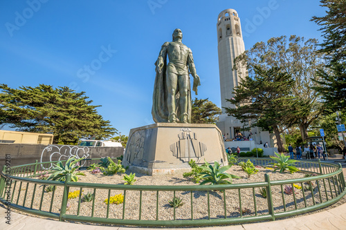 The statue of Christopher Columbus and Coit Tower. People lined up to climb the tower to see the city of San Francisco to 365 degrees. North Beach, on Telegraph Hill, California, United States.