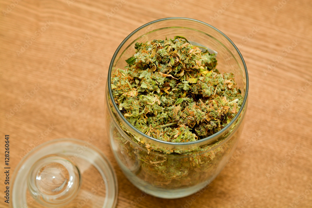 marijuana in a glass container marijuana in a glass container