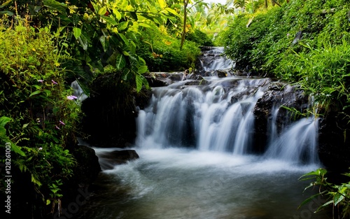 The flow of the river with a small waterfall