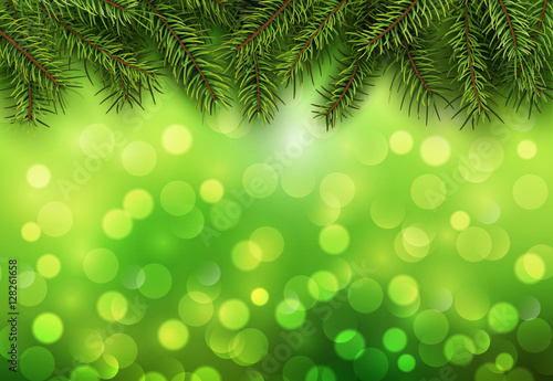 Christmas abstract background green blinking bokeh with pine tree.