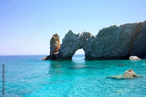 Typical view on Lalaria beach holey rock gate in Skiathos photo