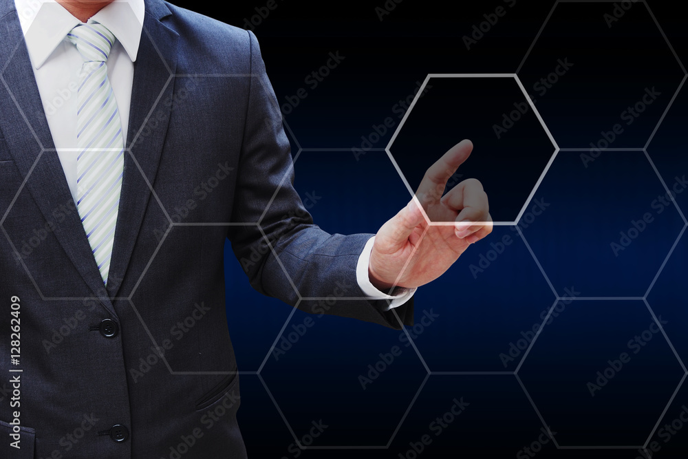 Business man hand touching virtual panel of icon polygon interfa Business man hand touching virtual panel of icon polygon interfa