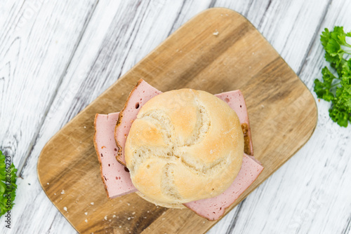 Fresh made Meat Loaf on rustic background photo