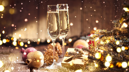 Christmas and celebration with champagne. New Year holiday decorated table