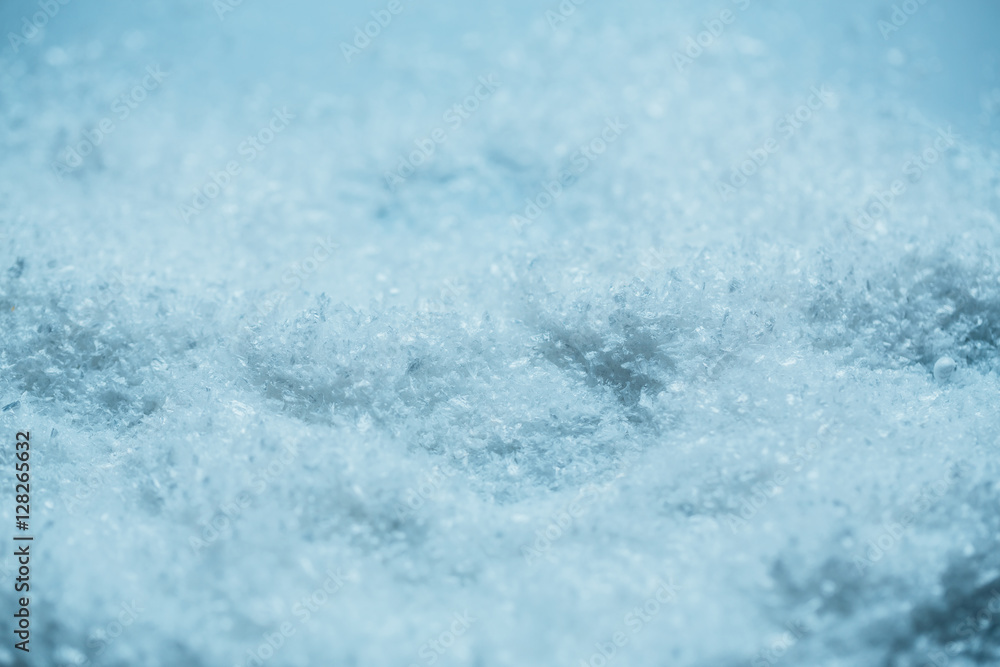 white snow background close up with a blue tone