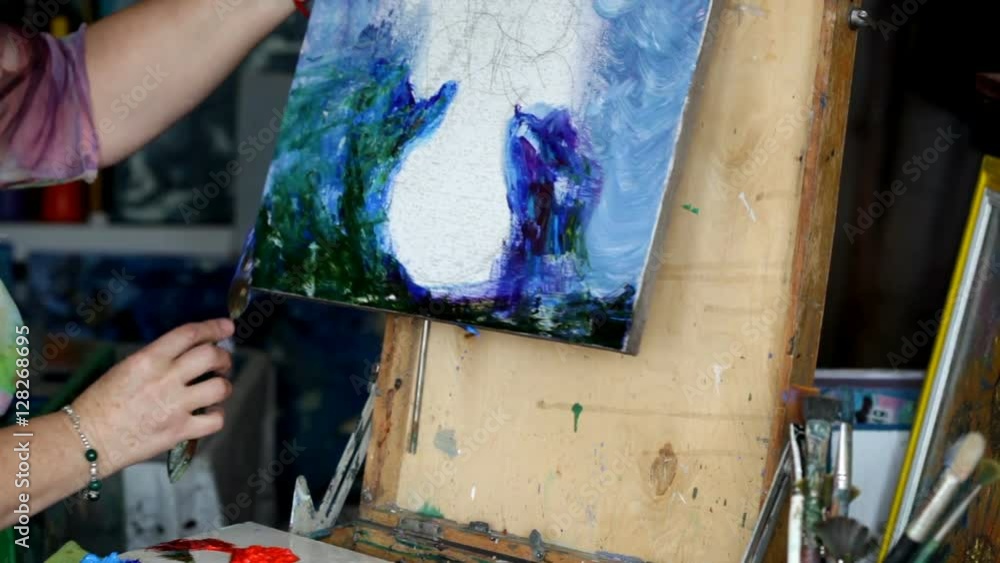 Process of oil painting, artist paints picture on canvas. Sunflowers. Process of oil painting, artist paints picture on canvas. Sunflowers.