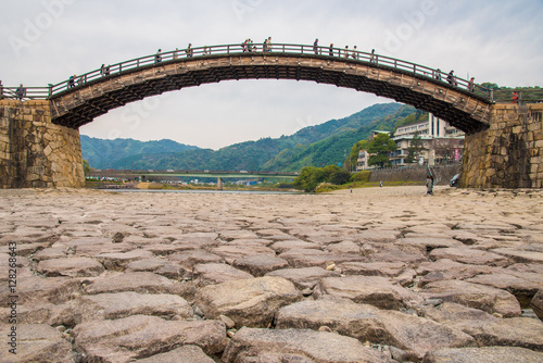 Kintai wooden arch bridge, Iwakuni, Japan (with tourist on the bridge)