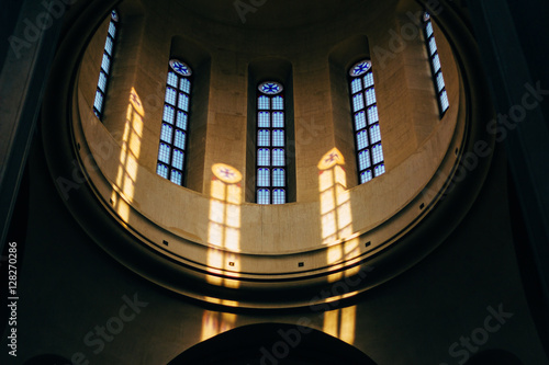 Holy Trinity Cathedral of Tbilisi - Sameba church interior. Sunshine falling from outside.