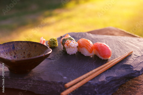 Japanese sushi on black stone outdoor