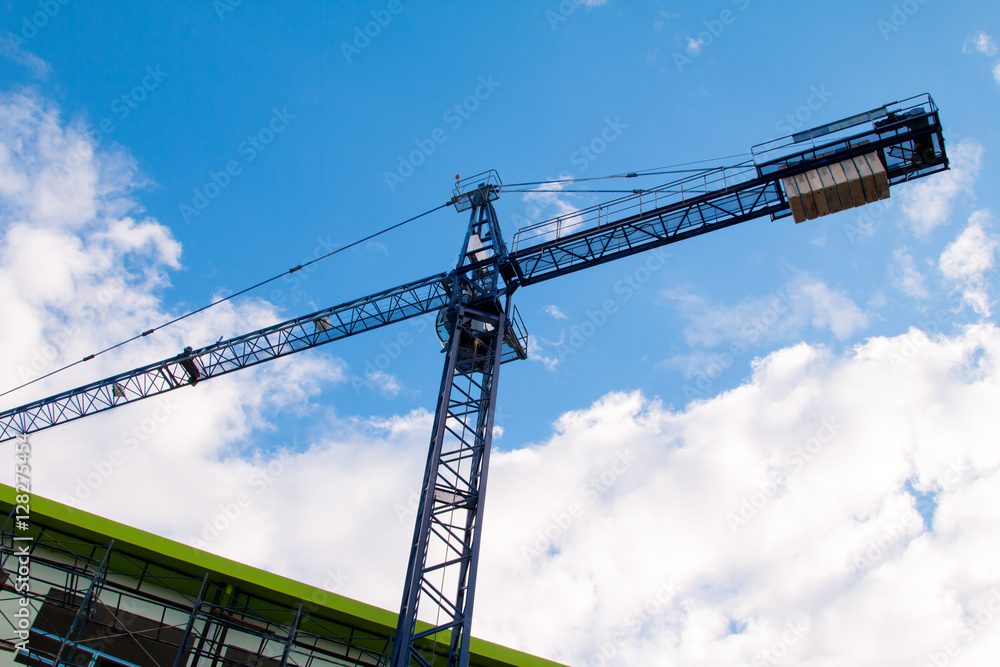 Construction site with cranes on sky background Construction site with cranes on sky background