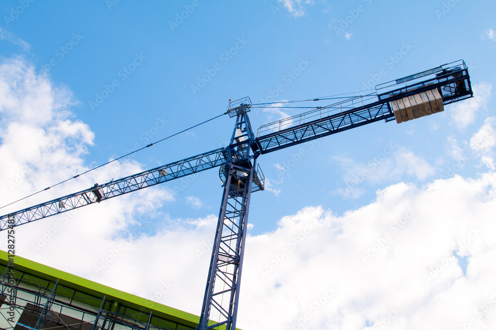 Construction site with cranes on sky background Construction site with cranes on sky background