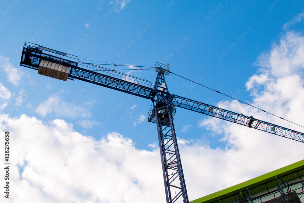 Construction site with cranes on sky background Construction site with cranes on sky background