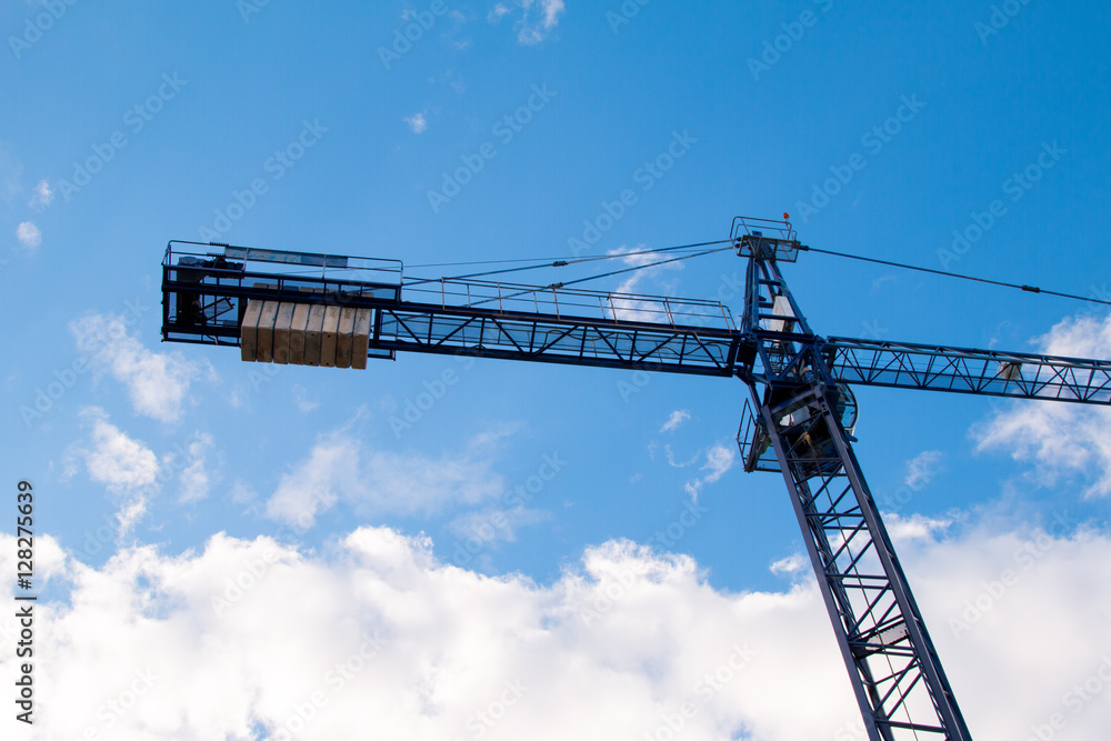Construction site with cranes on sky background Construction site with cranes on sky background