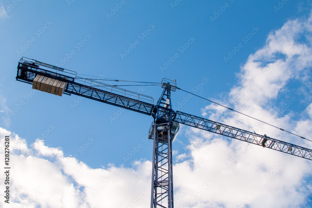 Construction site with cranes on sky background Construction site with cranes on sky background