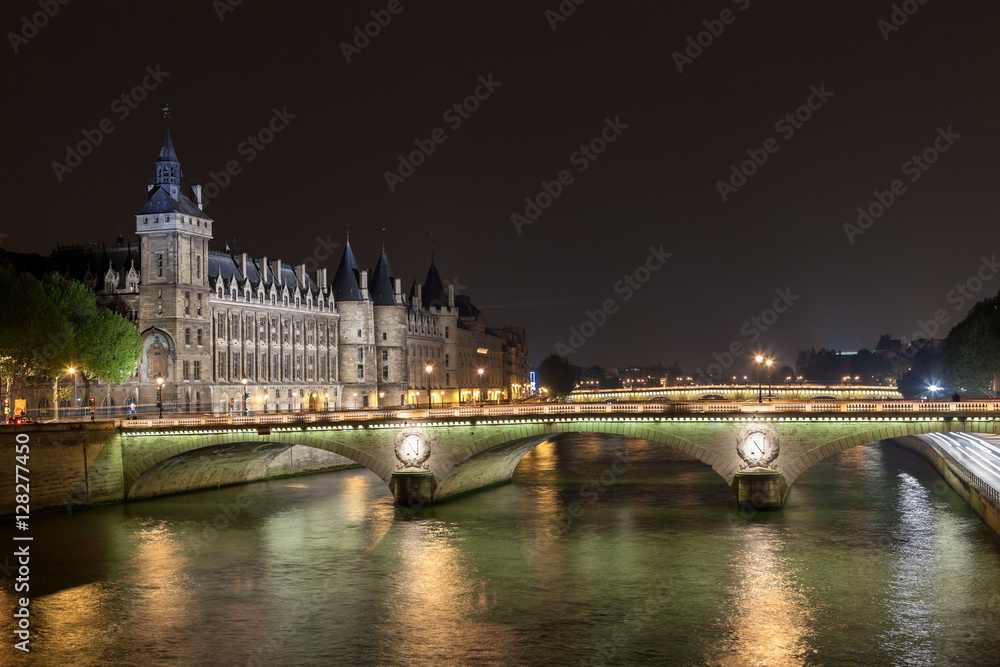 La Conciergerie and Pont au Change, over the Seine river. Paris, France.