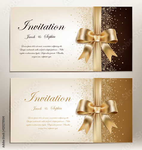 tow pretty wedding invitation with golden ribbon and bow.