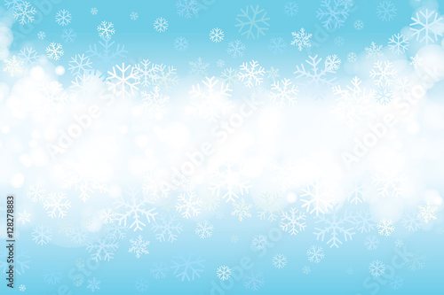Vector of Christmas snowflakes on blue background for winter season.