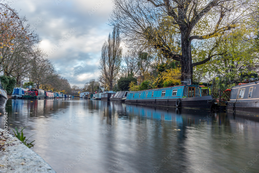 Water Canal and reflections in Little Venice in London in Autumn Water Canal and reflections in Little Venice in London in Autumn