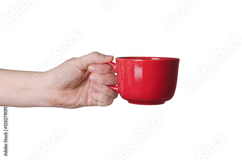 Hand holding a cup, isolated on white background photo