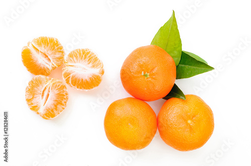 tangerine with separated segments on white background