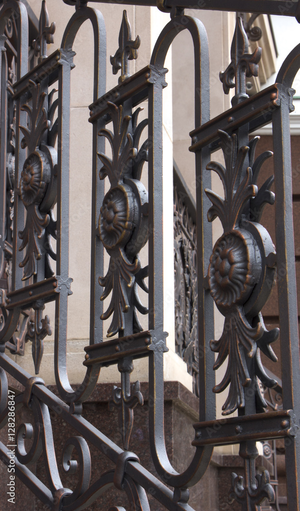 Fotografie Forged flower decorative element gates Hammered gates.