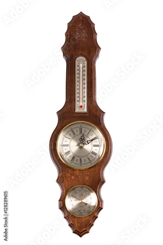 Vintage wooden wall clock with a barometer on a white background