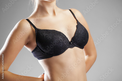 Obraz na plátně Woman breast in uplift