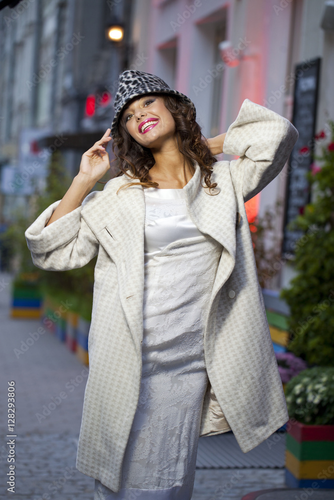 Fototapeta premium Young beautiful model in a stylish designer clothes