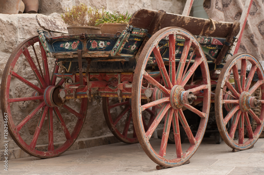 old cart as a decoration of the old town