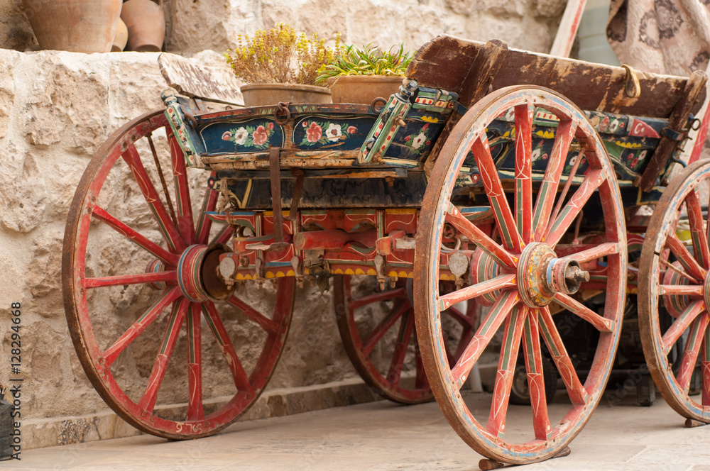 old cart as a decoration of the old town