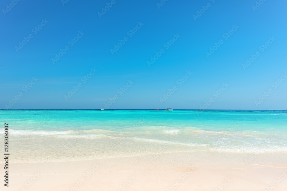 Beautiful gentel wave at tropical beach with clear sky