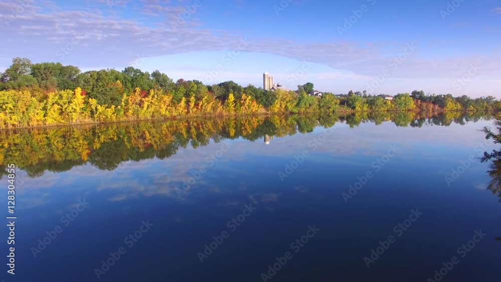 Aerial Flyover of Colorful Autumn Foliage at Picturesque Rivers Edge
Aerial Flyover of Colorful Autumn Foliage at Picturesque Rivers Edge