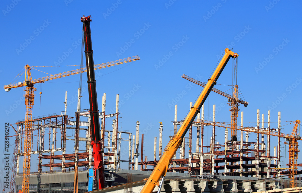 Fototapeta premium Construction site with cranes