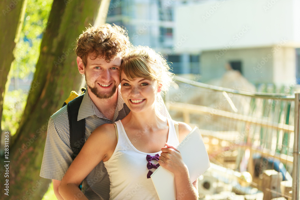 couple with blueprint project outdoor couple with blueprint project outdoor