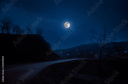 Full moon over road at night © zef art