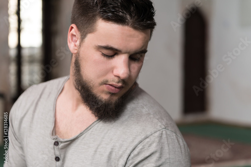 Young Muslim Guy Praying