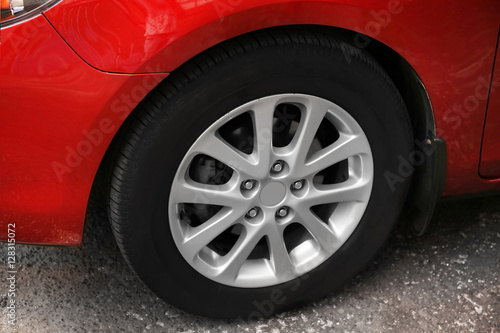 Red car wheel, close up © Africa Studio
