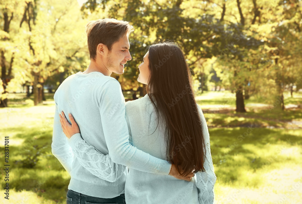 Lovely couple relaxing in park Lovely couple relaxing in park