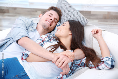 Lovely couple relaxing on c...